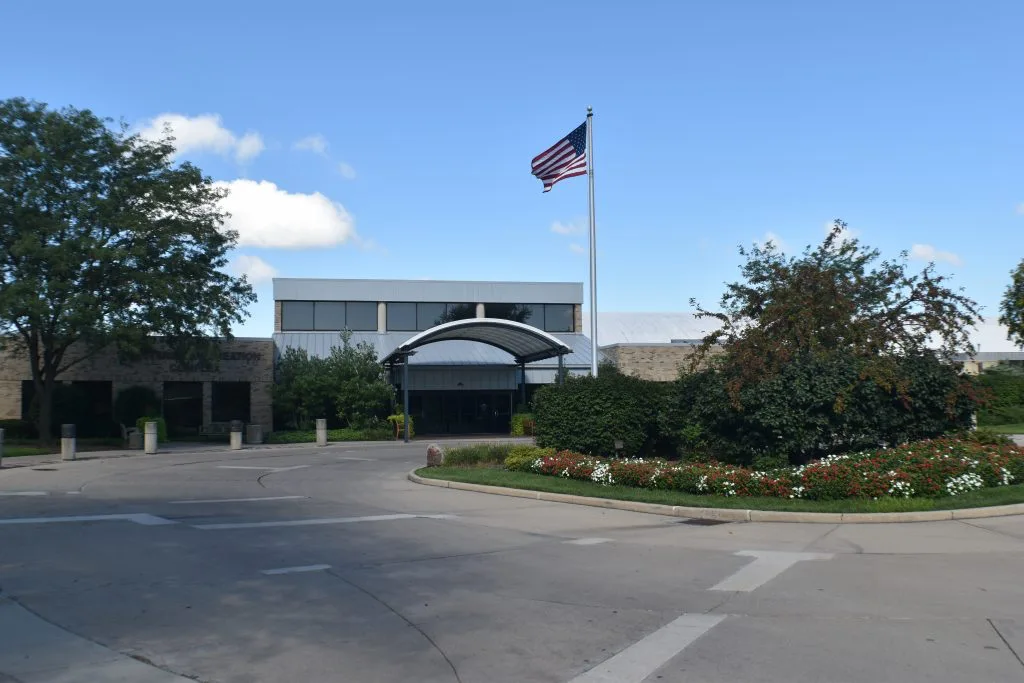 Main entrance of the Kettering Recreation Complex on a clear summer morning — Kettering Ice Arena