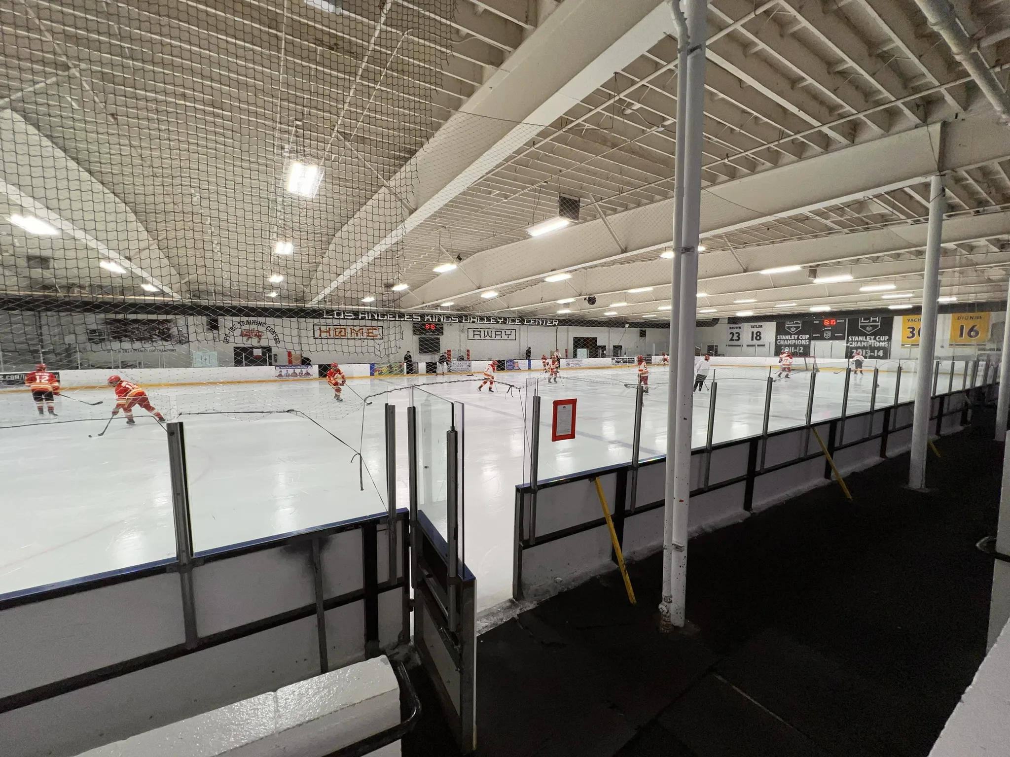 Almost the whole ice sheet seen from the walkway behind the boards — LA Kings Valley Ice Center