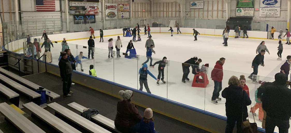 Skaters on the ice during a public session at Lake Delton Ice Arena, seen from the bleachers. — Lake Delton Ice Arena