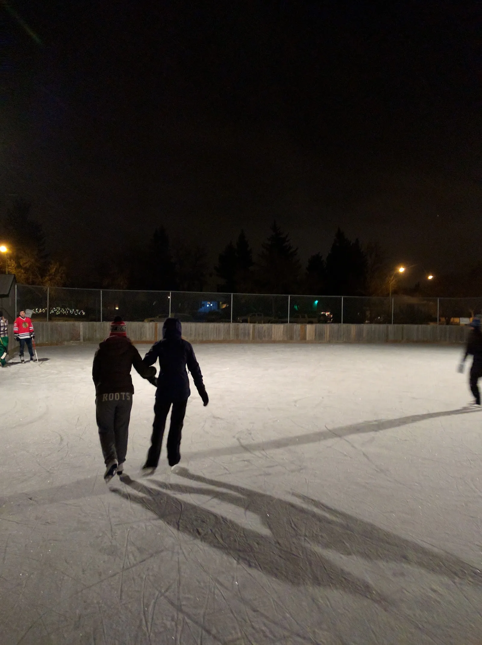 Skaters on the Lakeview Park rink at night, Regina (Google Maps listing photo) — Lakeview Park Outdoor Rink (Regina)