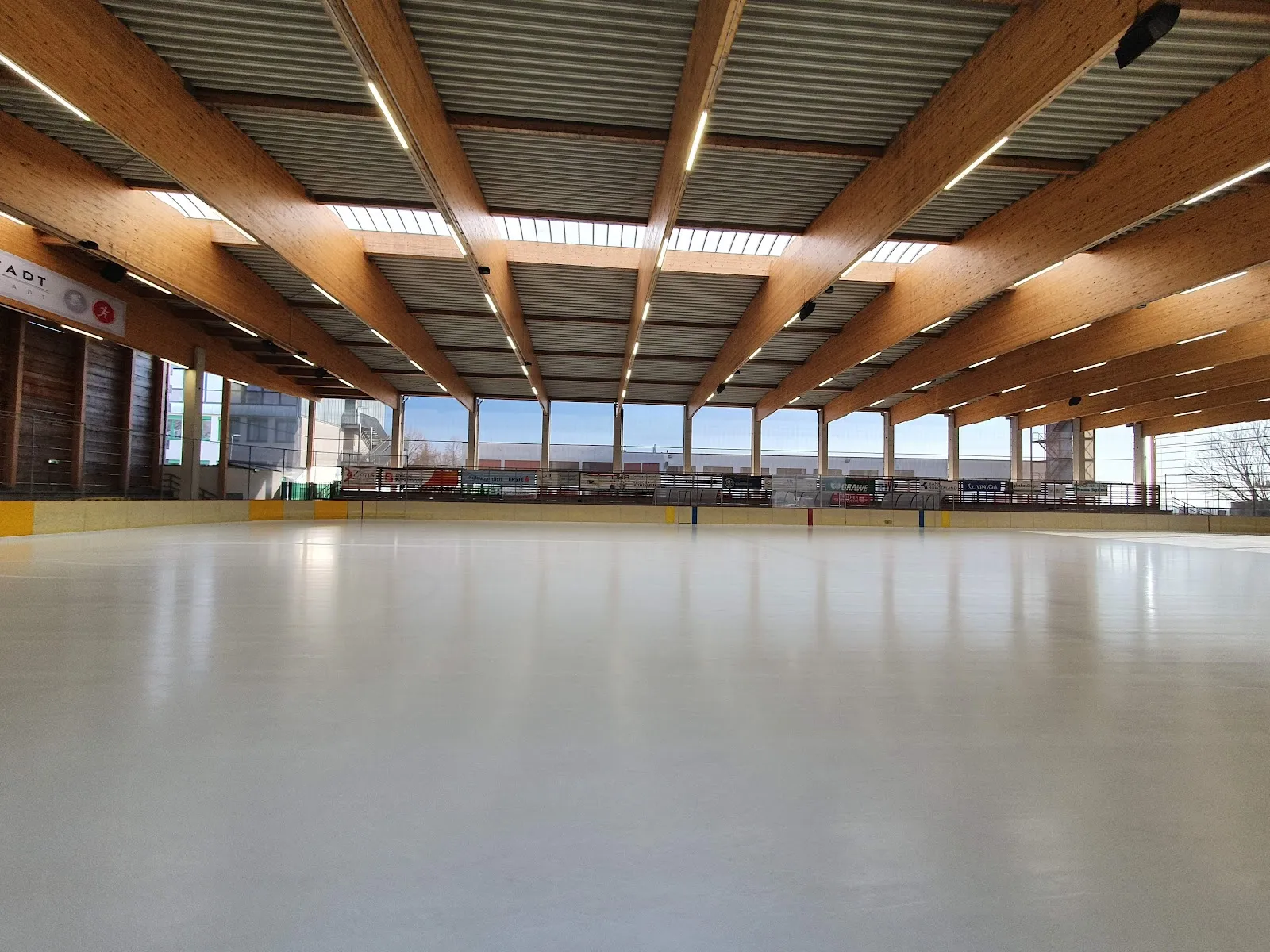 The ice surface under the timber roof of the Leithana ice arena in Bruck an der Leitha. — Leithana Ice Arena