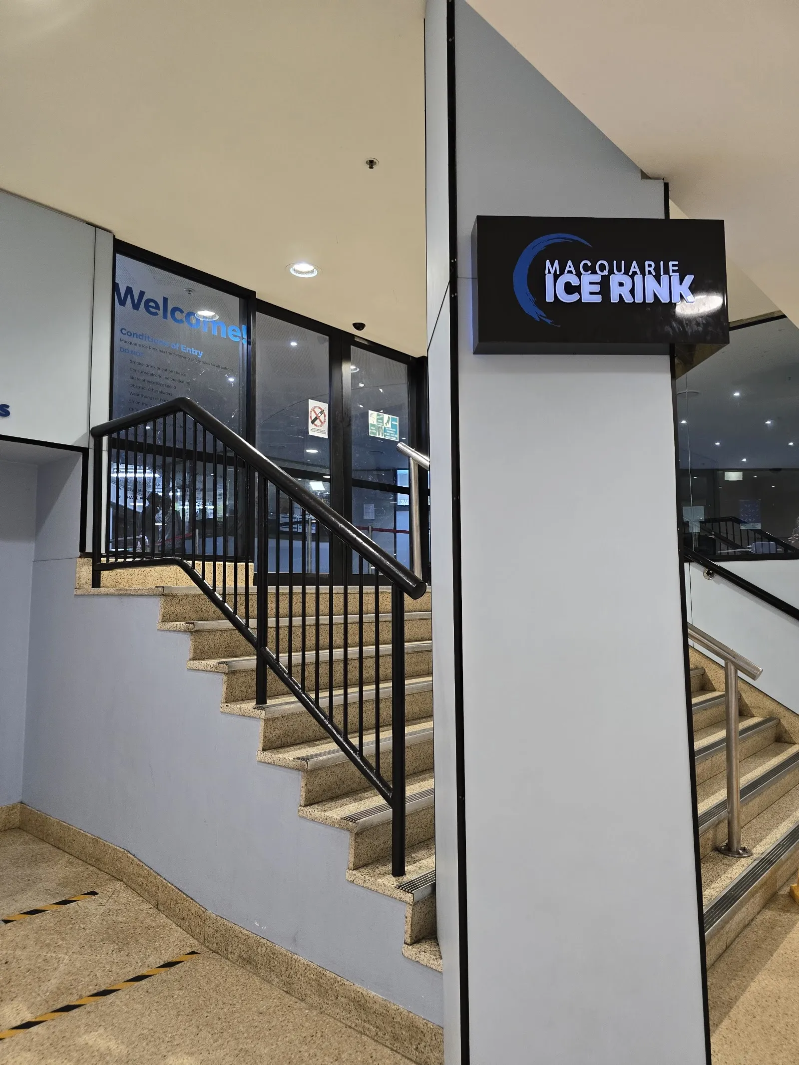 The entrance and signage of Macquarie Ice Rink on level 1 of Macquarie Centre — Macquarie Ice Rink