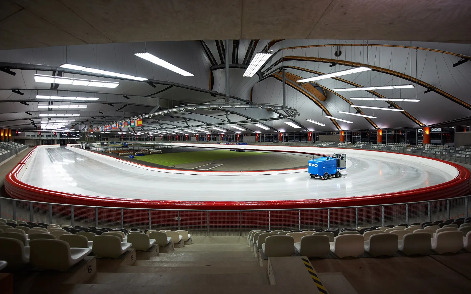 The 400-metre oval of the Max Aicher Arena with the hockey infield — Max Aicher Arena Inzell