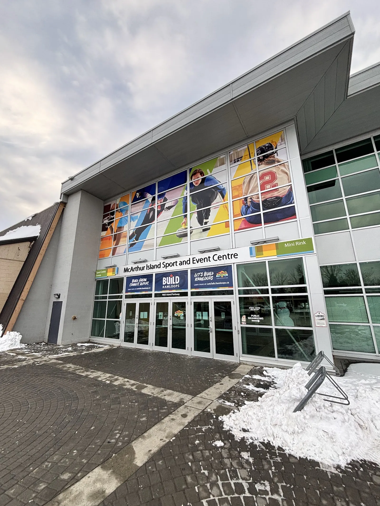 The glass-fronted entrance of the McArthur Island Sport and Event Centre. — McArthur Island Sport and Event Centre