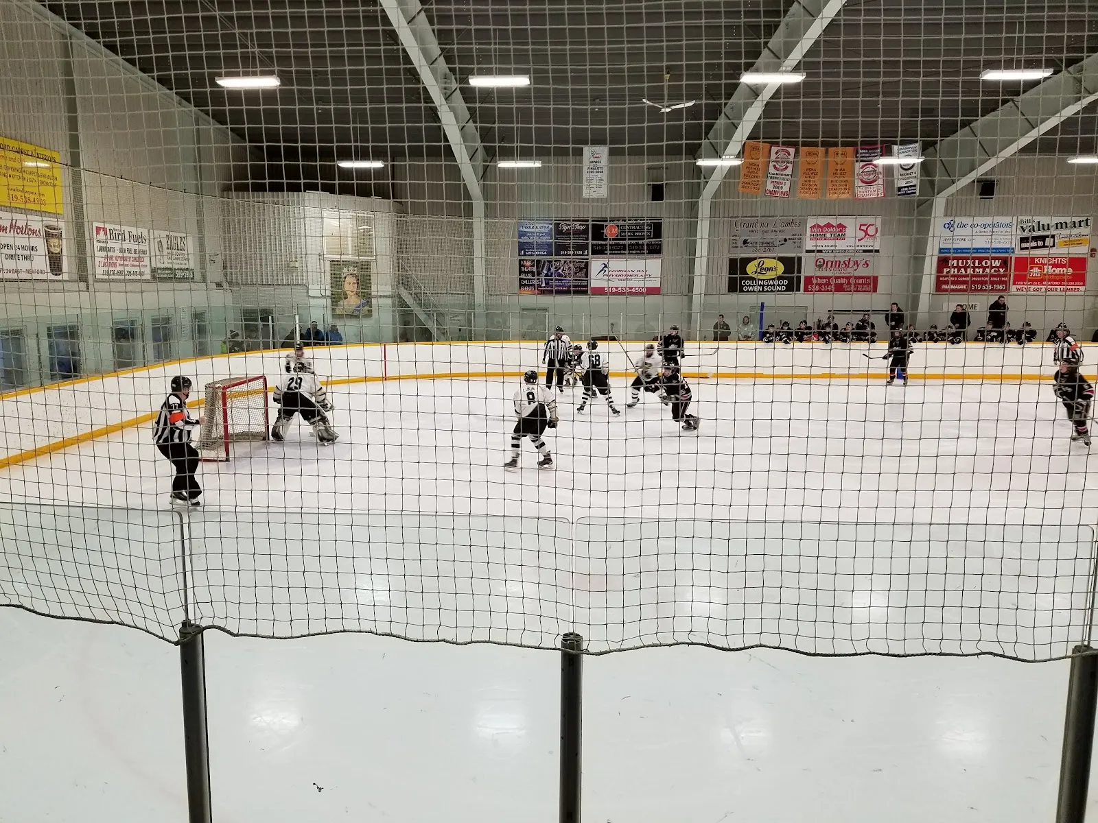 A hockey game on the ice at the Meaford and St. Vincent Community Centre — Meaford and St. Vincent Community Centre