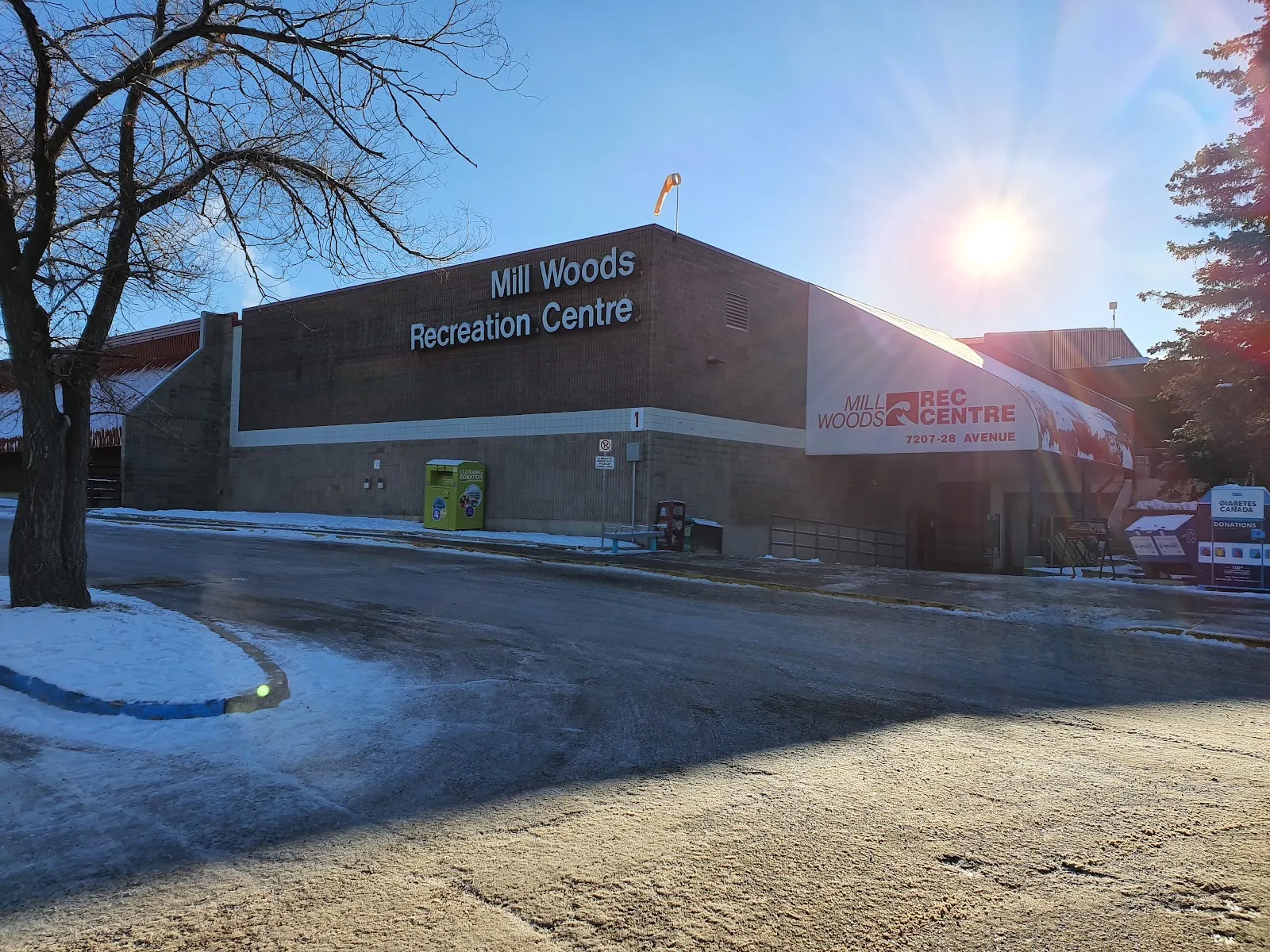 The Mill Woods Recreation Centre at 7207 28 Avenue in Edmonton, the building that holds the twin arena, on a sunny winter day — Mill Woods Twin Arena