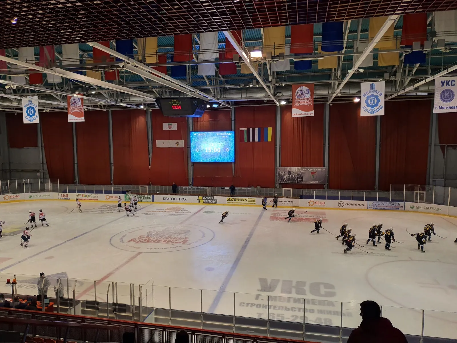 The ice sheet and stands of the Mogilev Ice Palace during a hockey game — Mogilev Ice Palace