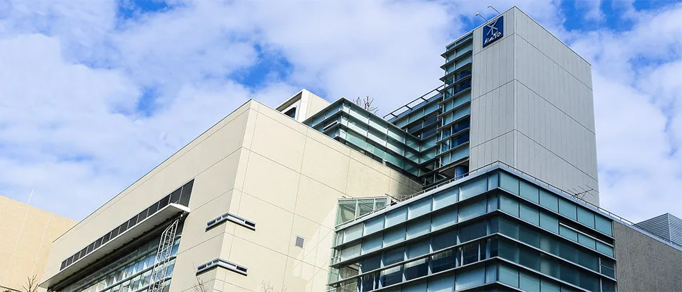 The glass and panel tower of the Naniwa Sports Center building in Naniwa ward, Osaka, which houses the ice rink — Naniwa Ice Skating Rink (Naniwa Sports Center)