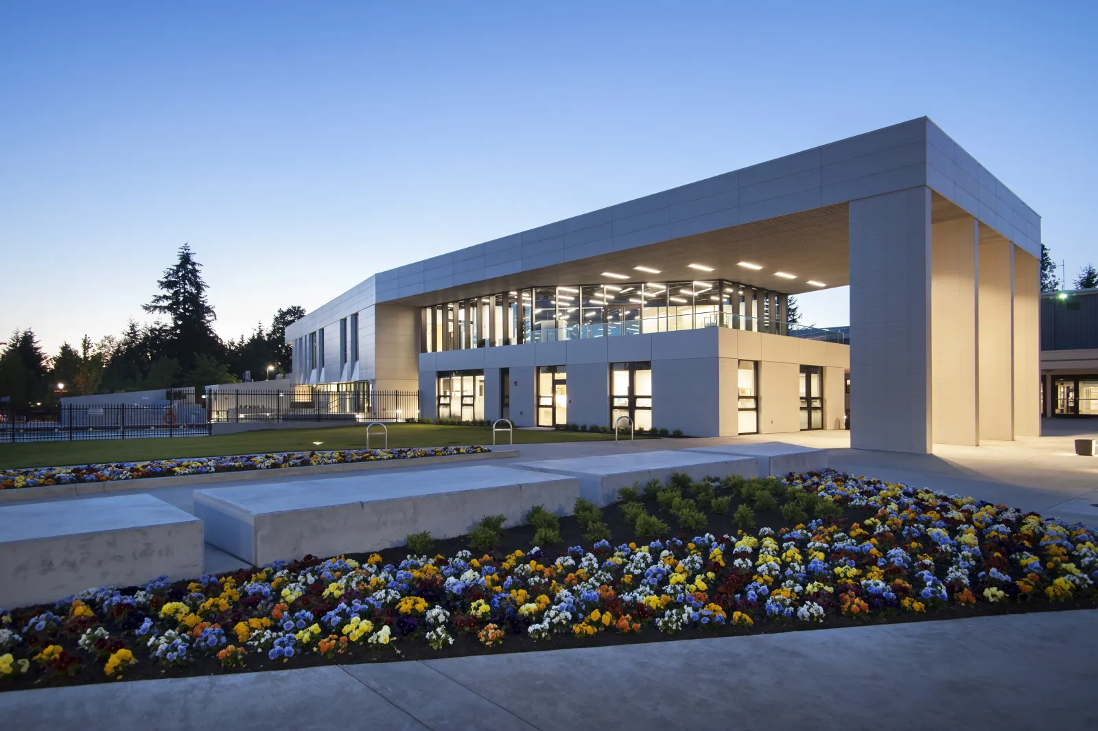 North Delta Recreation Centre, 11415 84 Avenue, Delta: the building at dusk (City of Delta photo) — North Delta Recreation Centre
