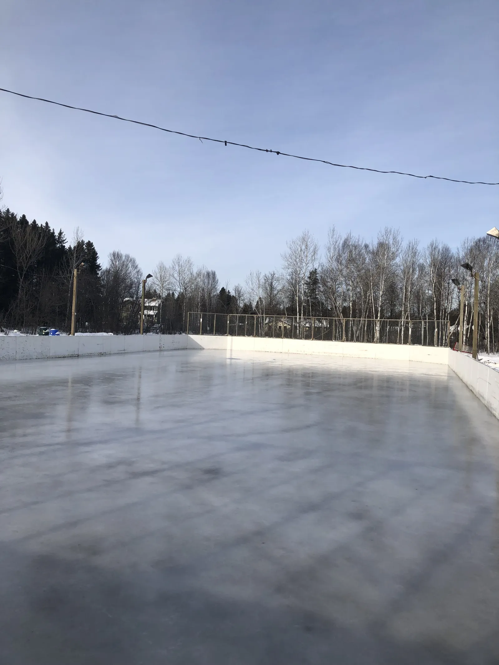 The North Neebing Park boarded rink with a smooth sheet of ice — North Neebing Park Outdoor Rink