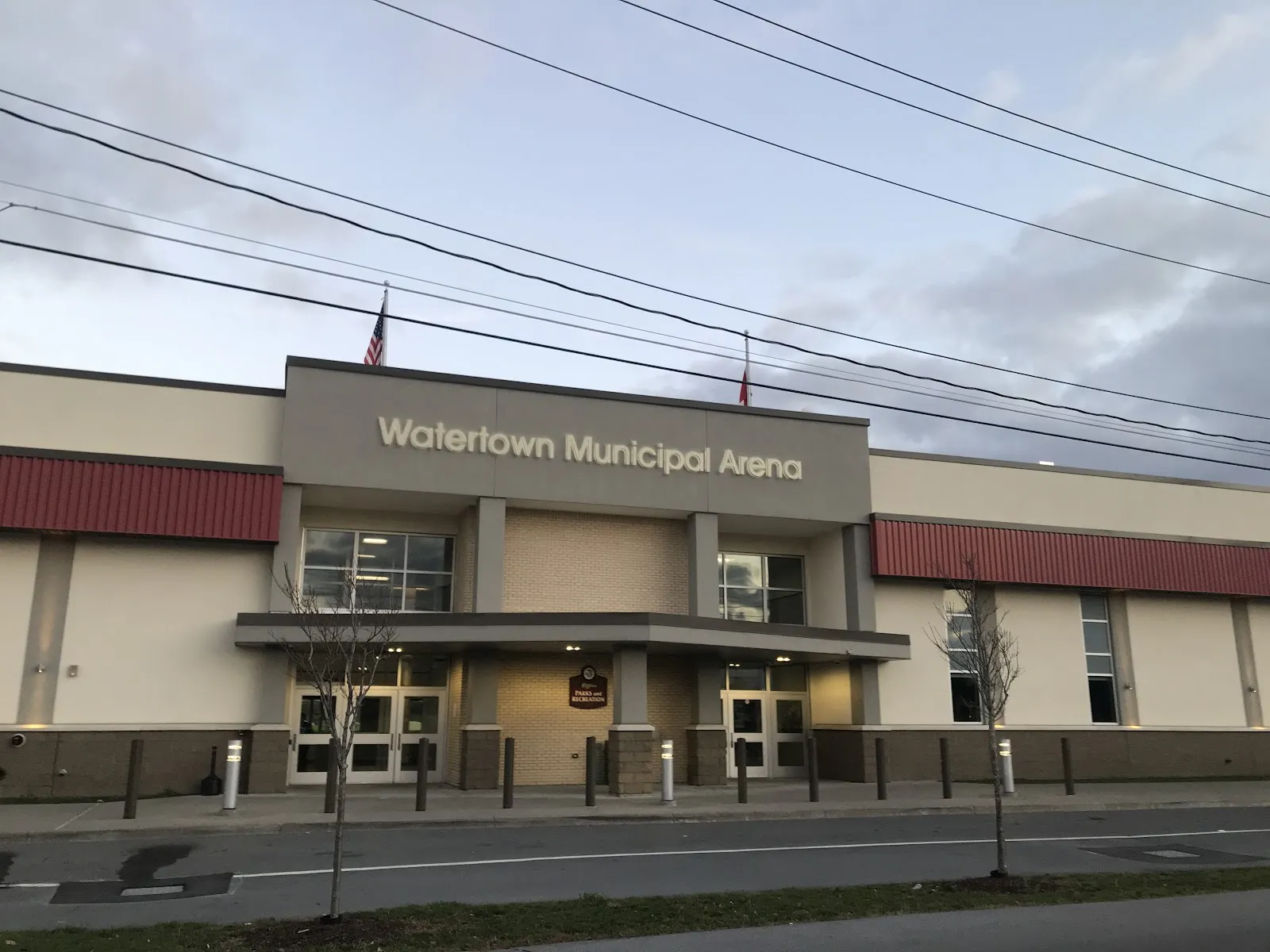 Front of the Watertown Municipal Arena, 600 William T Field Drive, at dusk — Northern Credit Union Community Arena