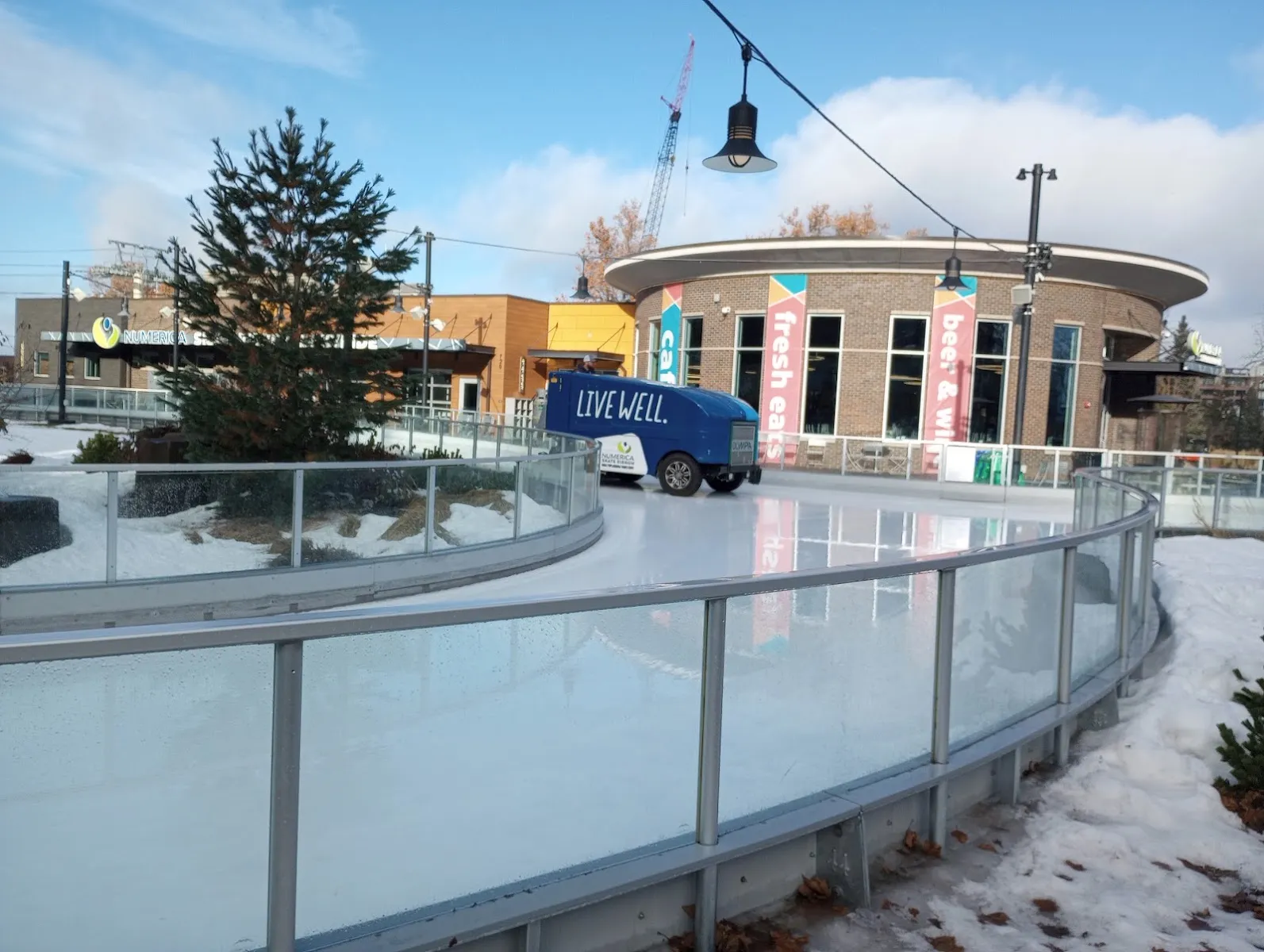 The Numerica Skate Ribbon curving past the round pavilion in Riverfront Park, Spokane — Numerica Skate Ribbon