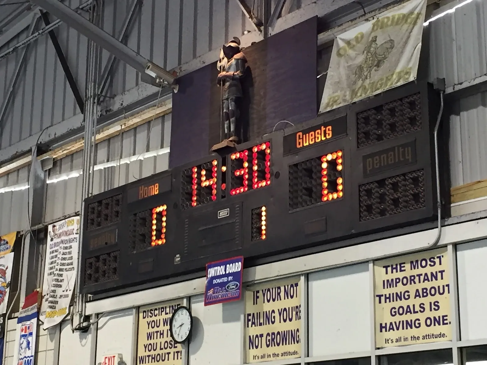 The scoreboard and wall banners inside John Piccolo Arena (photo from the Google Maps listing) — Old Bridge John Piccolo Ice Arena