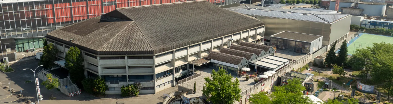The Patinoires du Littoral seen from above, beside the lake and the Stade de la Maladière — Patinoires du Littoral