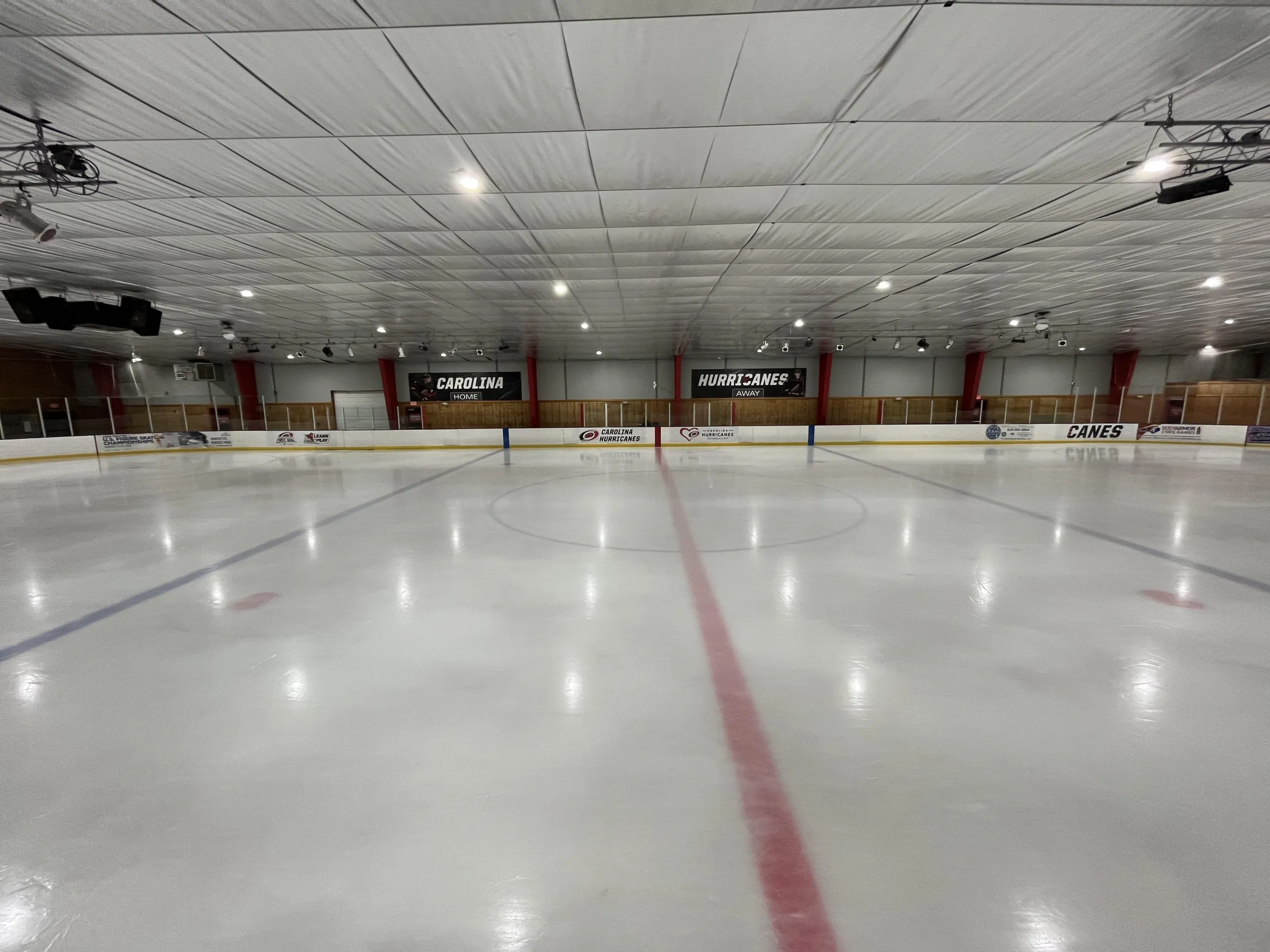 Fresh ice below a low fabric-lined ceiling — Polar Ice Garner