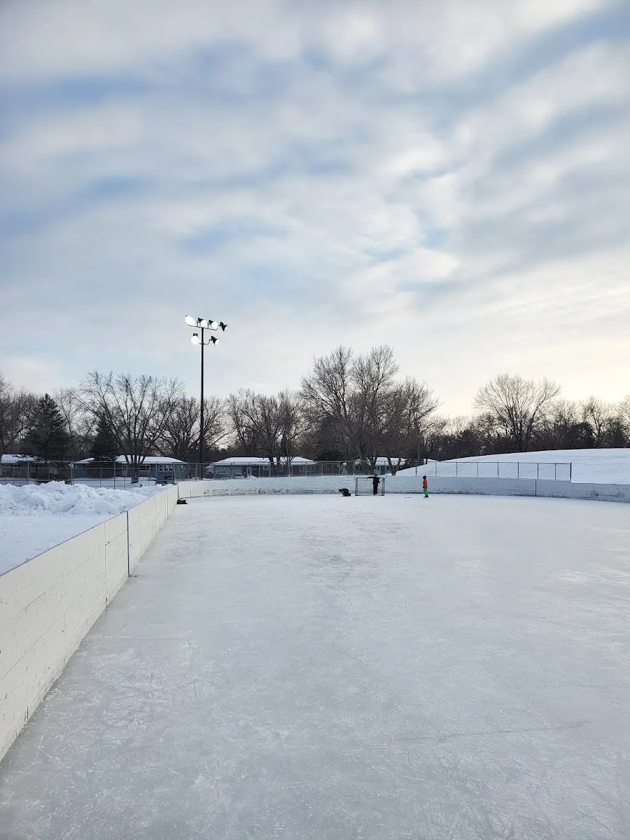 Ice and boards at the Poplar Bridge Park outdoor rink, Bloomington (Google Maps listing photo) — Poplar Bridge Park Outdoor Rink