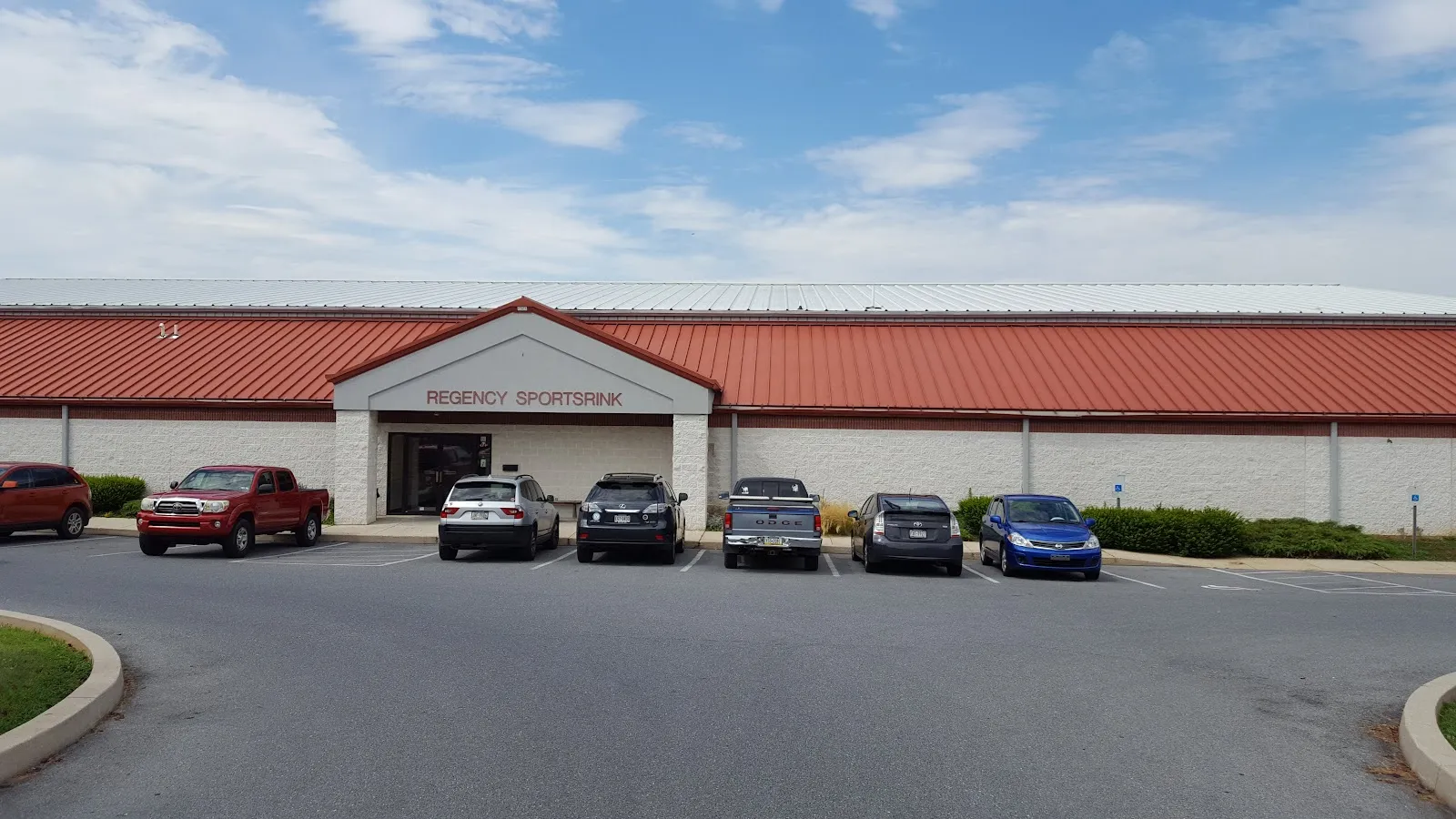 The Regency Sportsrink building and entrance, 2155 Ambassador Dr — Regency Ice Rink