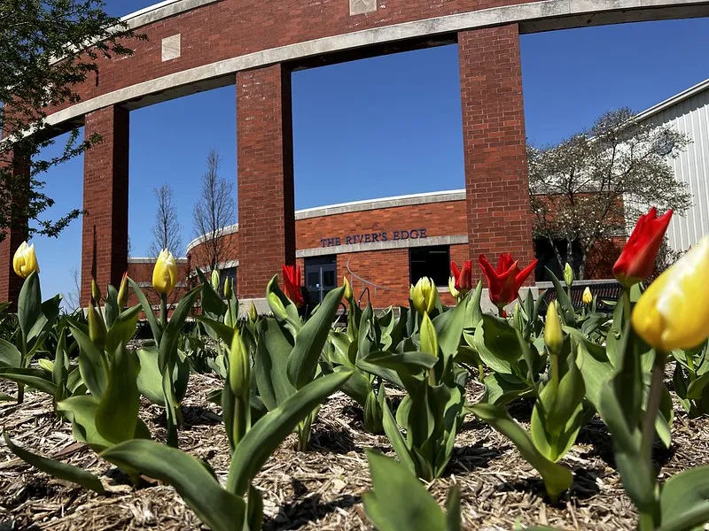 The River's Edge arena entrance in spring, Davenport — The River's Edge Ice Arena