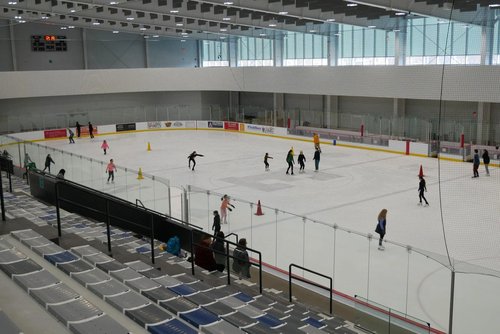 A public skate seen from the seating bowl — Robert Crown Community Center