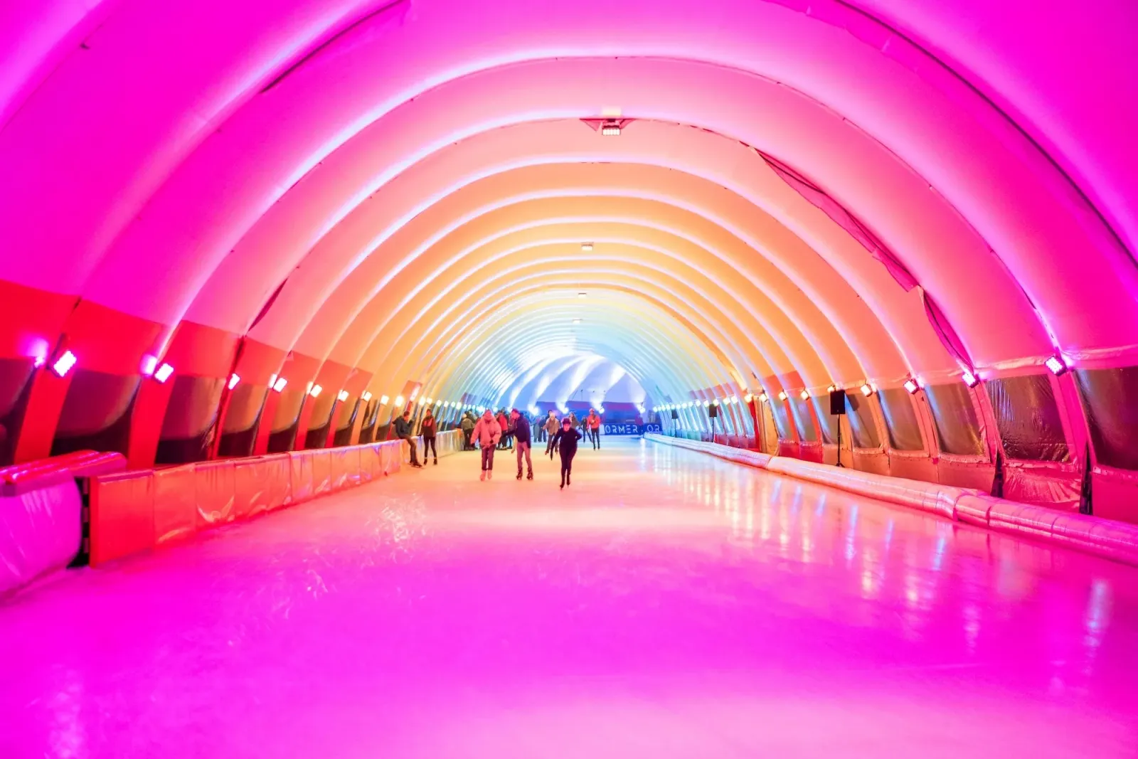 The ice inside the covered 400 metre tunnel at Schaatsbaan Rotterdam, lit in colour — Schaatsbaan Rotterdam