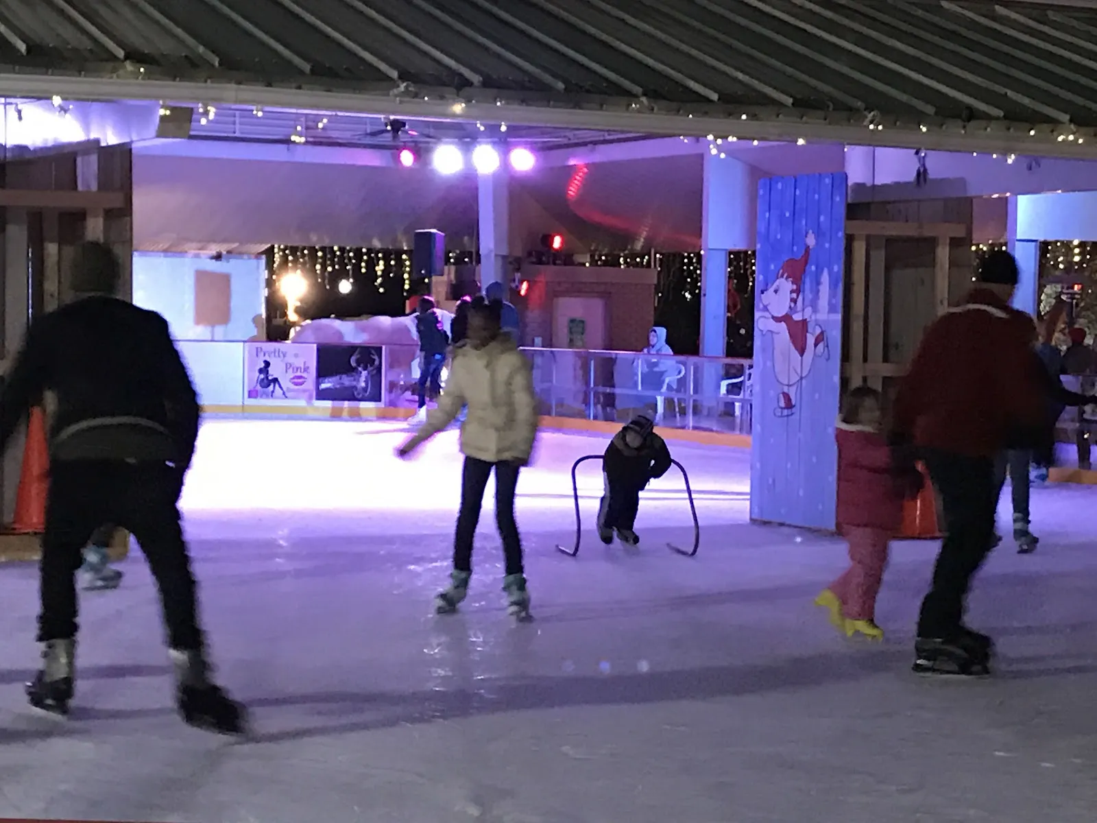 Skaters on the Ice Days rink in the Randy Mills Pavilion at Celebration Park, Olde Town Conyers — Skate Conyers (Ice Days)