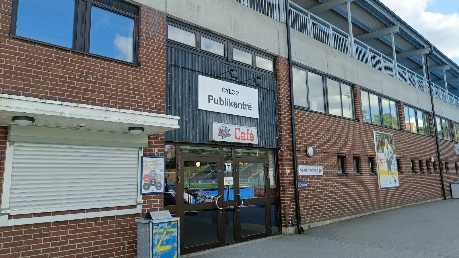 The public entrance and café side of the brick arena building at Sollentunavallen – Sollentunavallen (A-hallen)