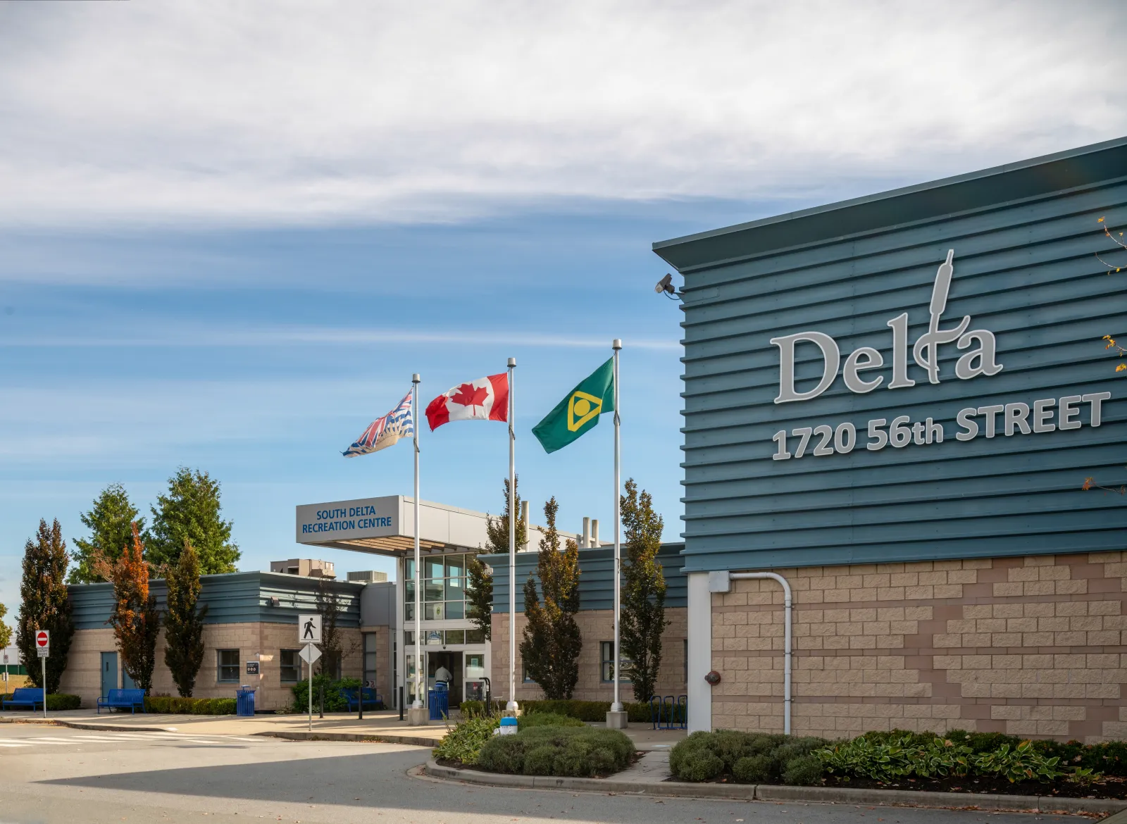 South Delta Recreation Centre, 1720 56th Street, Delta: the entrance sign and flags (City of Delta photo) — South Delta Recreation Centre