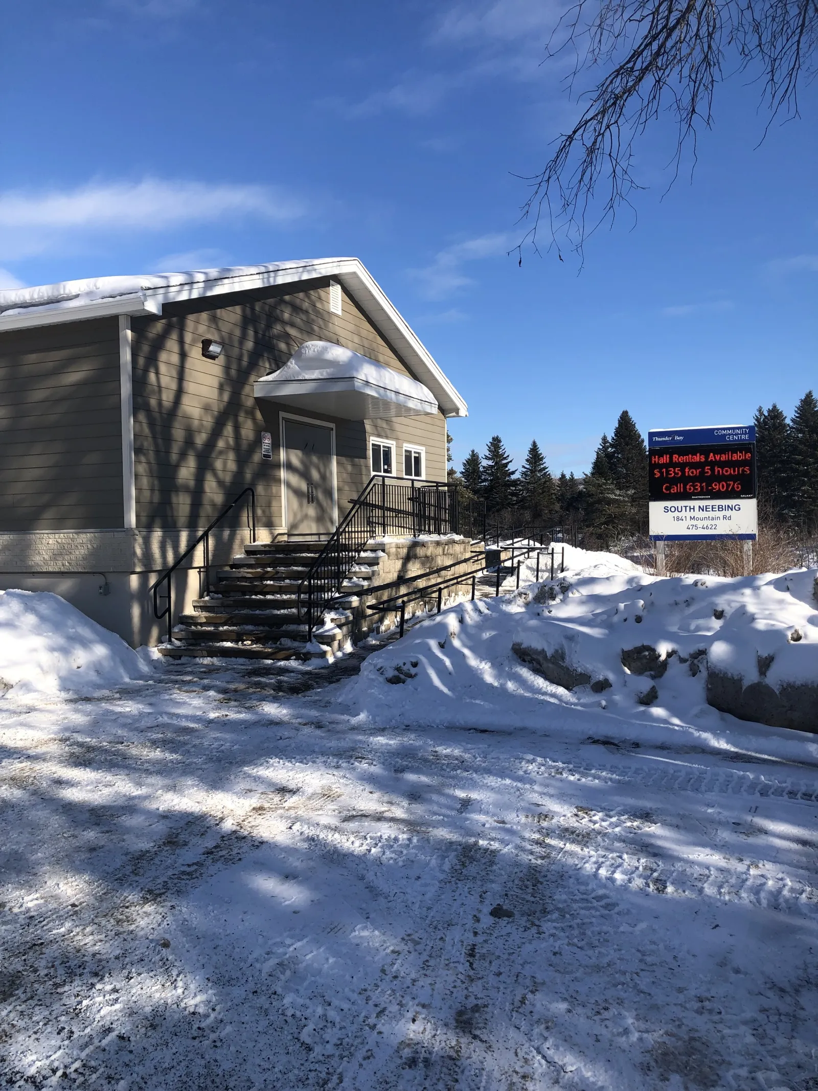 The South Neebing Community Centre building and sign beside the rink — South Neebing Community Centre Outdoor Rink