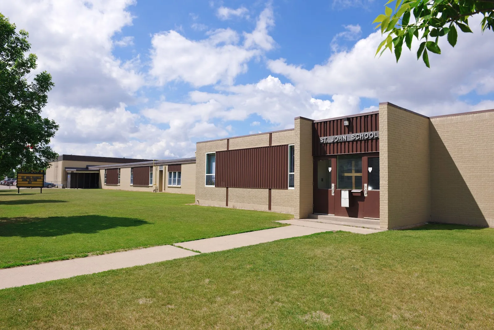 The outside of St. John School Outdoor Rink (Holiday Park), in a photo from its Google Maps listing. — St. John School Outdoor Rink (Holiday Park)