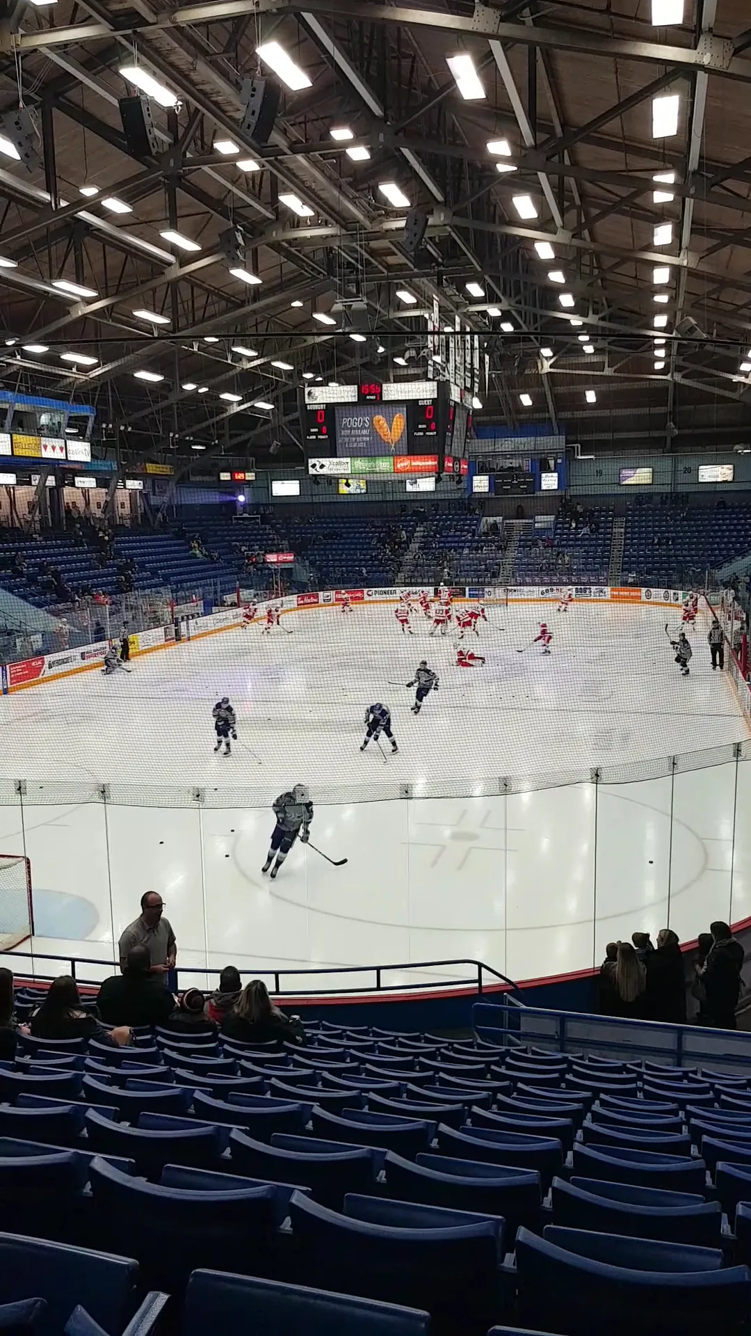 Sudbury Community Arena: a game under way seen from the lower stands — Sudbury Community Arena
