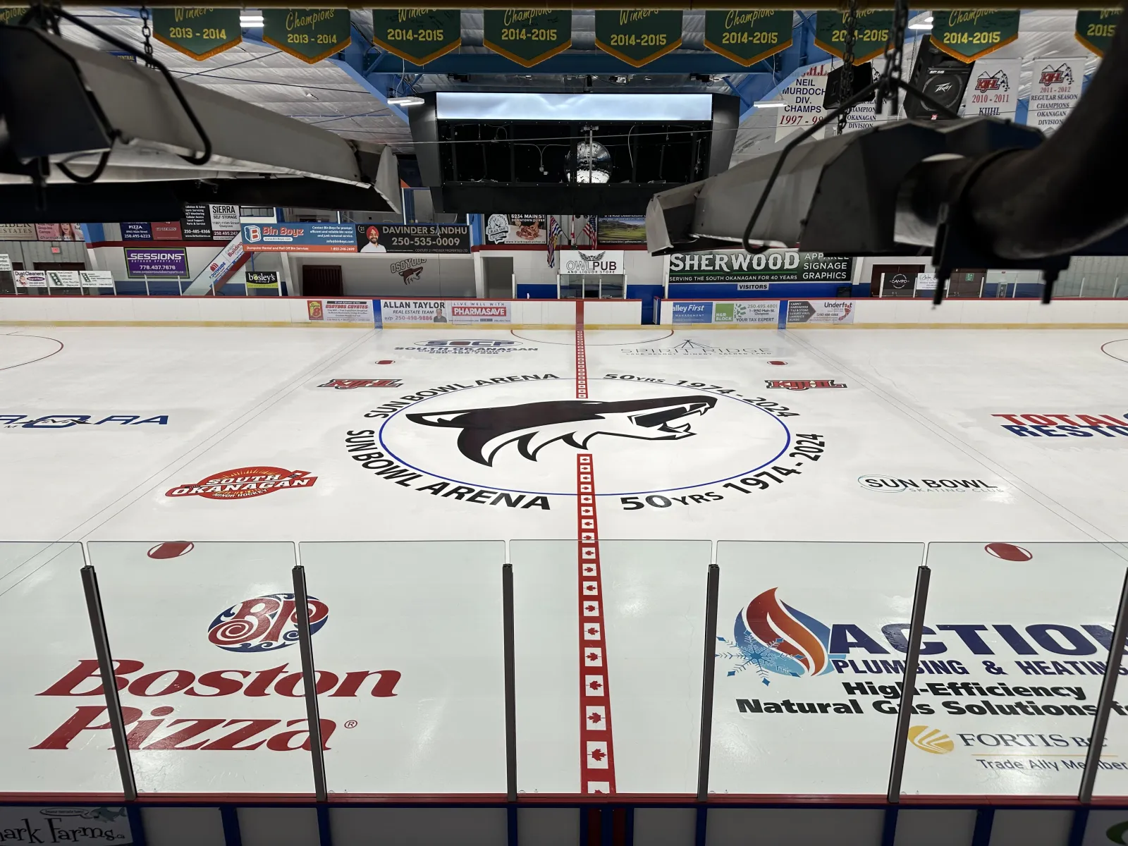 Center ice at the Sun Bowl Arena, with the 50th-anniversary logo (1974-2024), from the Town of Osoyoos Sun Bowl page. — Sun Bowl Arena