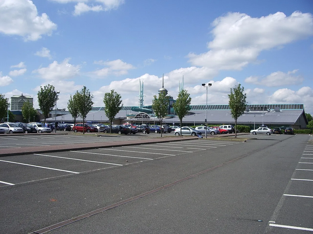 The Time Capsule leisure complex in Coatbridge seen across its car park — The Time Capsule Ice Rink