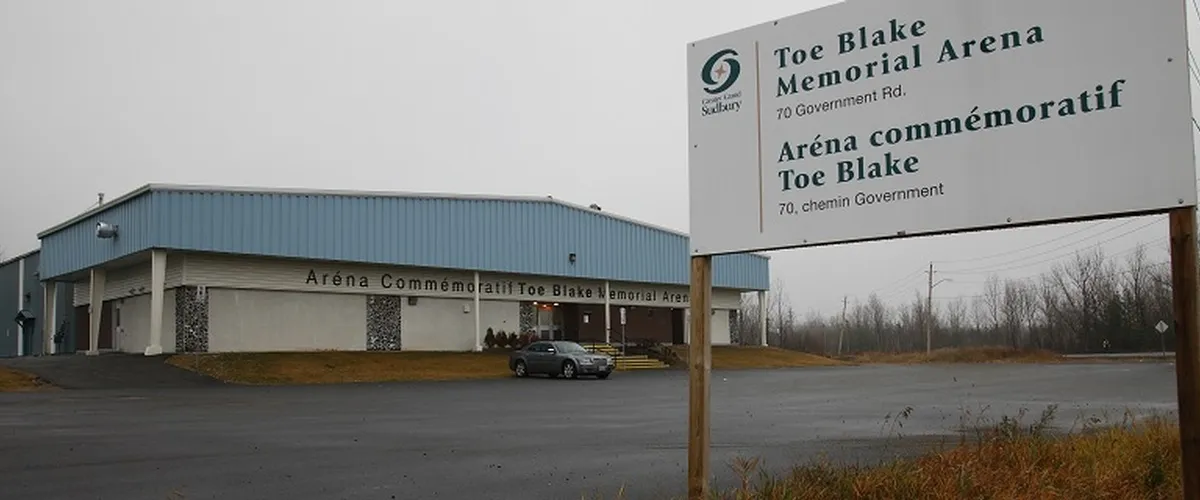 Toe Blake Memorial Arena, 70 Government Road, Coniston: the arena and its sign (City of Greater Sudbury photo) — Toe Blake Memorial Arena