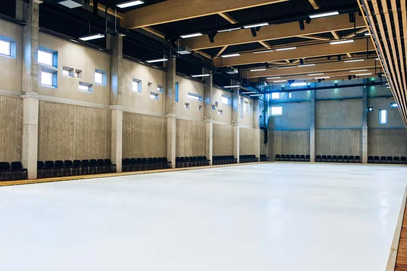 An ice sheet at Tondiraba Ice Hall with the stands behind — Tondiraba Jäähall