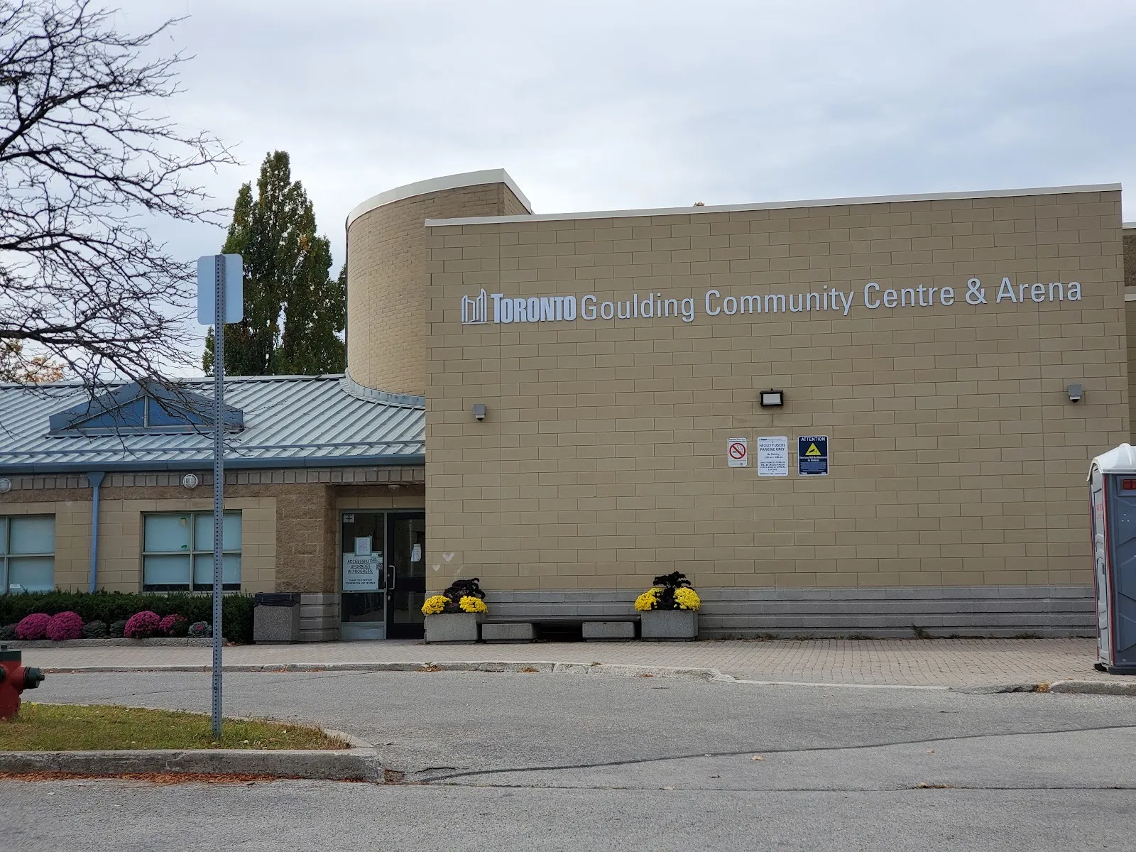 The Goulding Community Centre and Arena on Goulding Avenue in Toronto, with its lettered name across the tan brick front — Goulding Community Recreation Centre