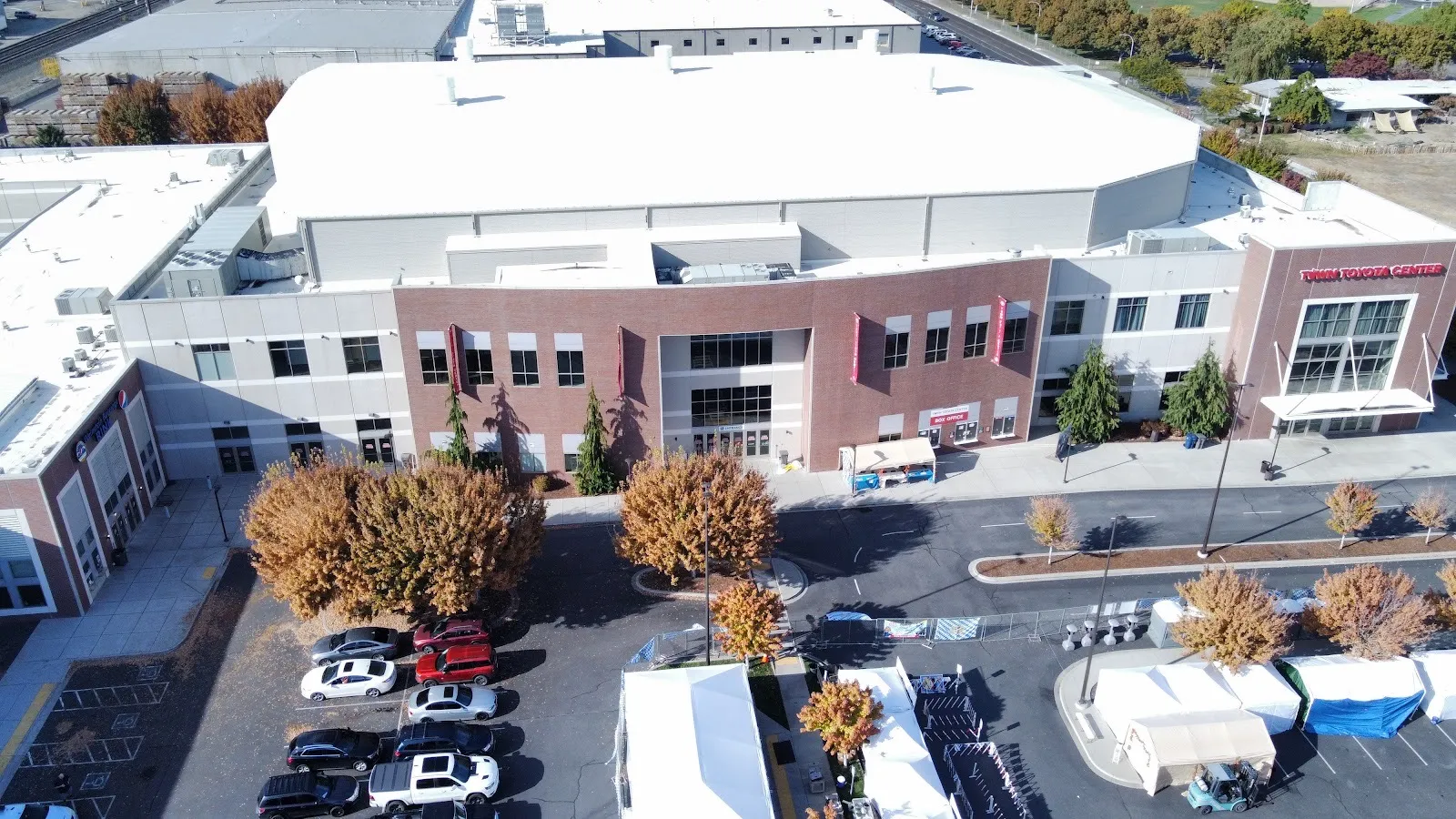 Aerial view of Town Toyota Center in Wenatchee, showing the brick front with the box office and the main arena roof behind — Town Toyota Center