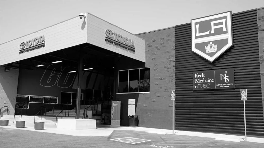 Black-and-white daylight exterior — Toyota Sports Performance Center