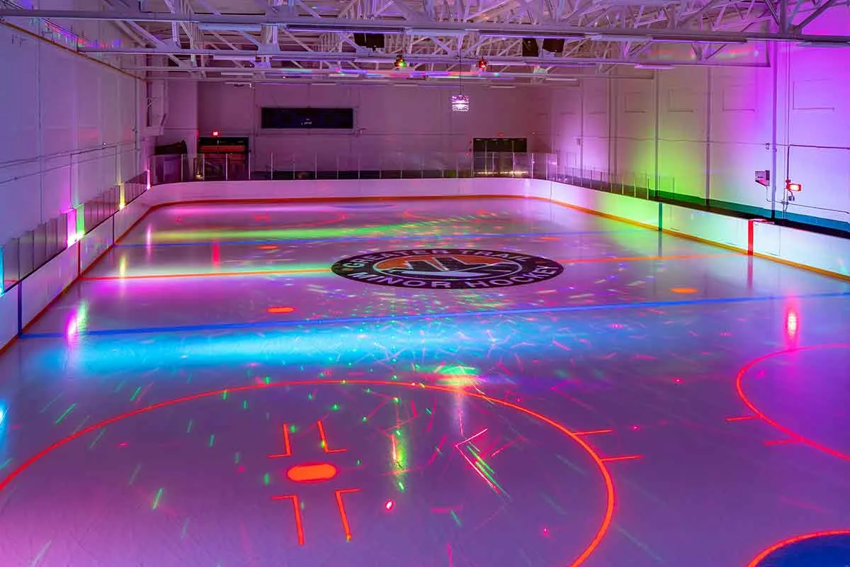 The Kids Rink at the Trail Memorial Centre during a glow skate, from the City of Trail's facility page — Trail Memorial Centre