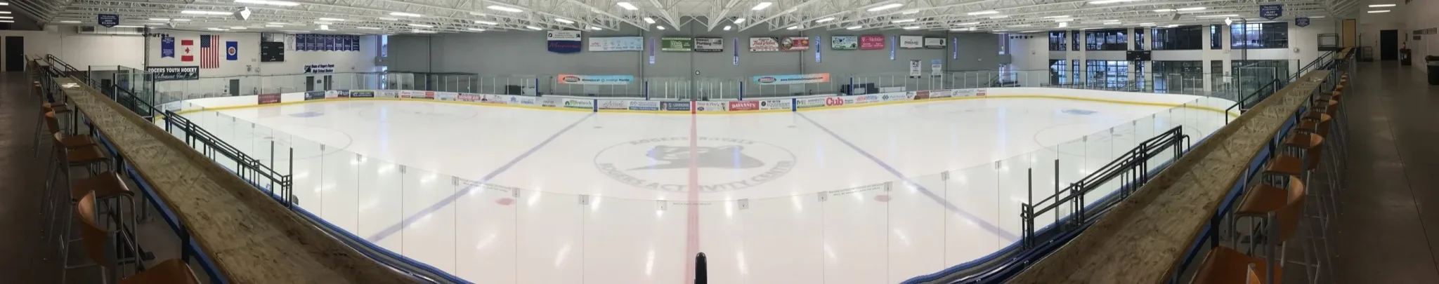 Empty ice sheet taken from the seating rail on one side — TruStone Center (formerly Rogers Activity Center)