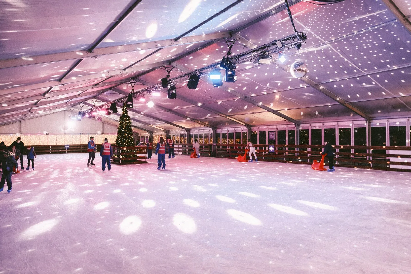 The covered TwinkleTown ice rink with its Christmas tree and disco lights, from the ice skating page — TwinkleTown Ice Skating (Smithfield Square)