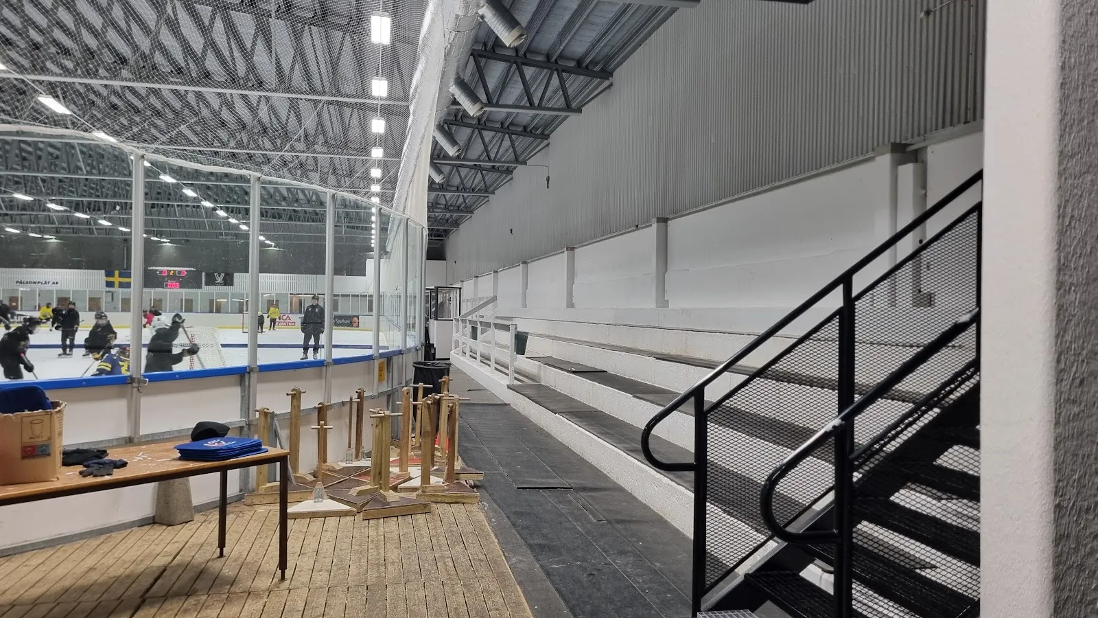 The stands and rink boards inside Veddige ishall — Veddige ishall