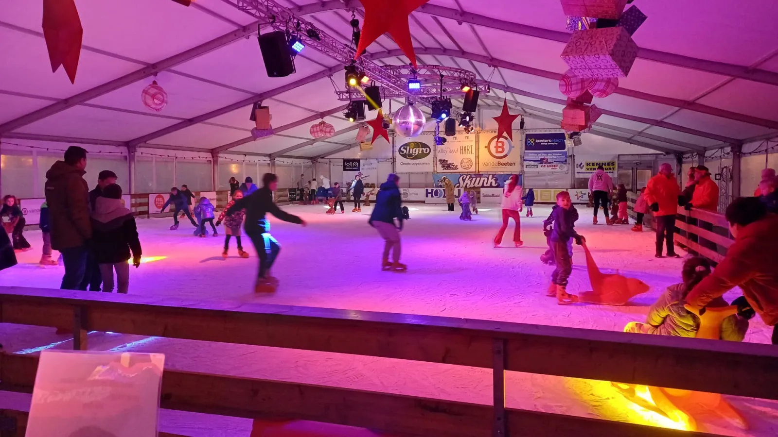 The ice under the tent roof of Veghel on Ice, lit in colour — Veghel on Ice