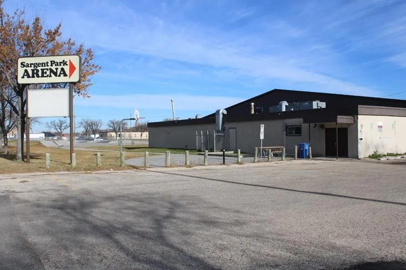 The Sargent Park Arena building and its roadside sign, seen from the car park — Sargent Park Arena