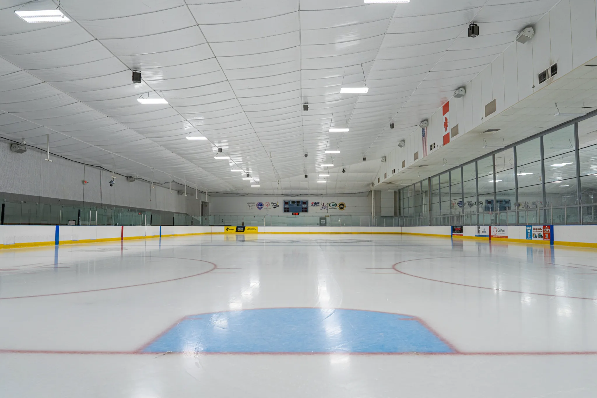 Whole sheet seen from ice level behind one goal line — Serpentini Arena at Winterhurst