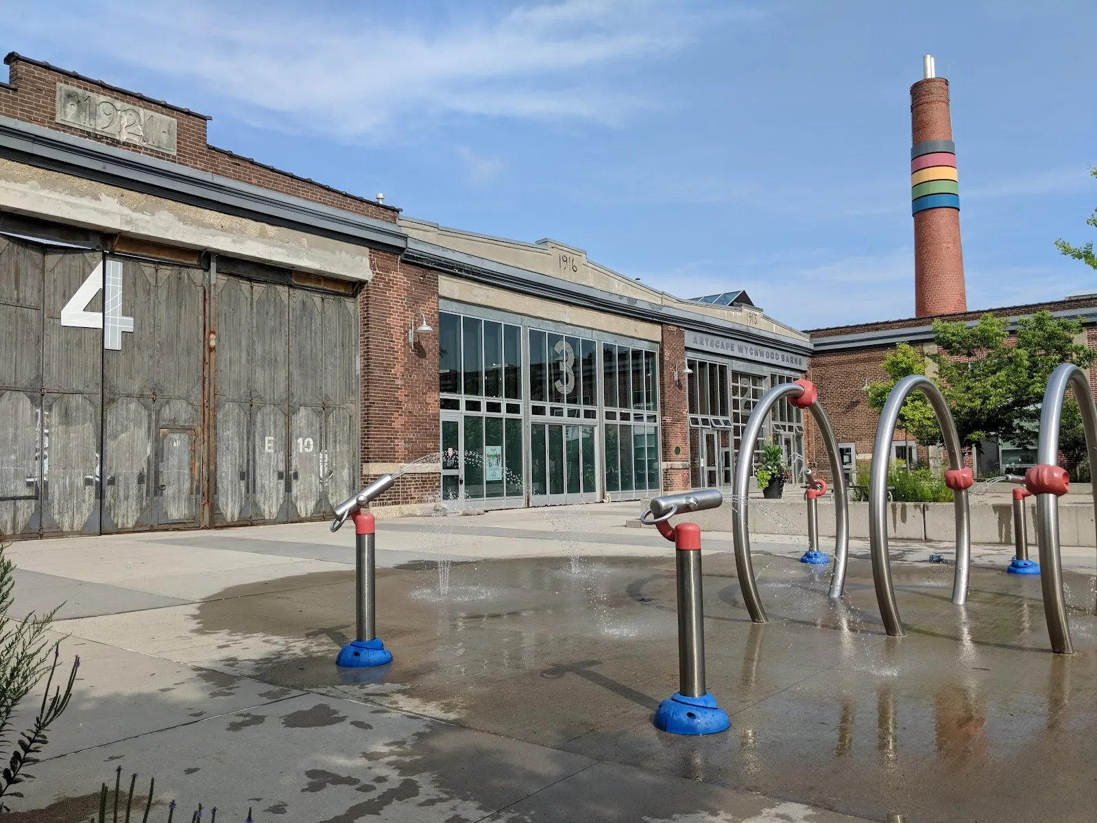 The Wychwood Barns and plaza in Wychwood Barns Park, home of the rink, in a photo from its Google Maps listing. — Wychwood Barns Park Natural Ice Rink