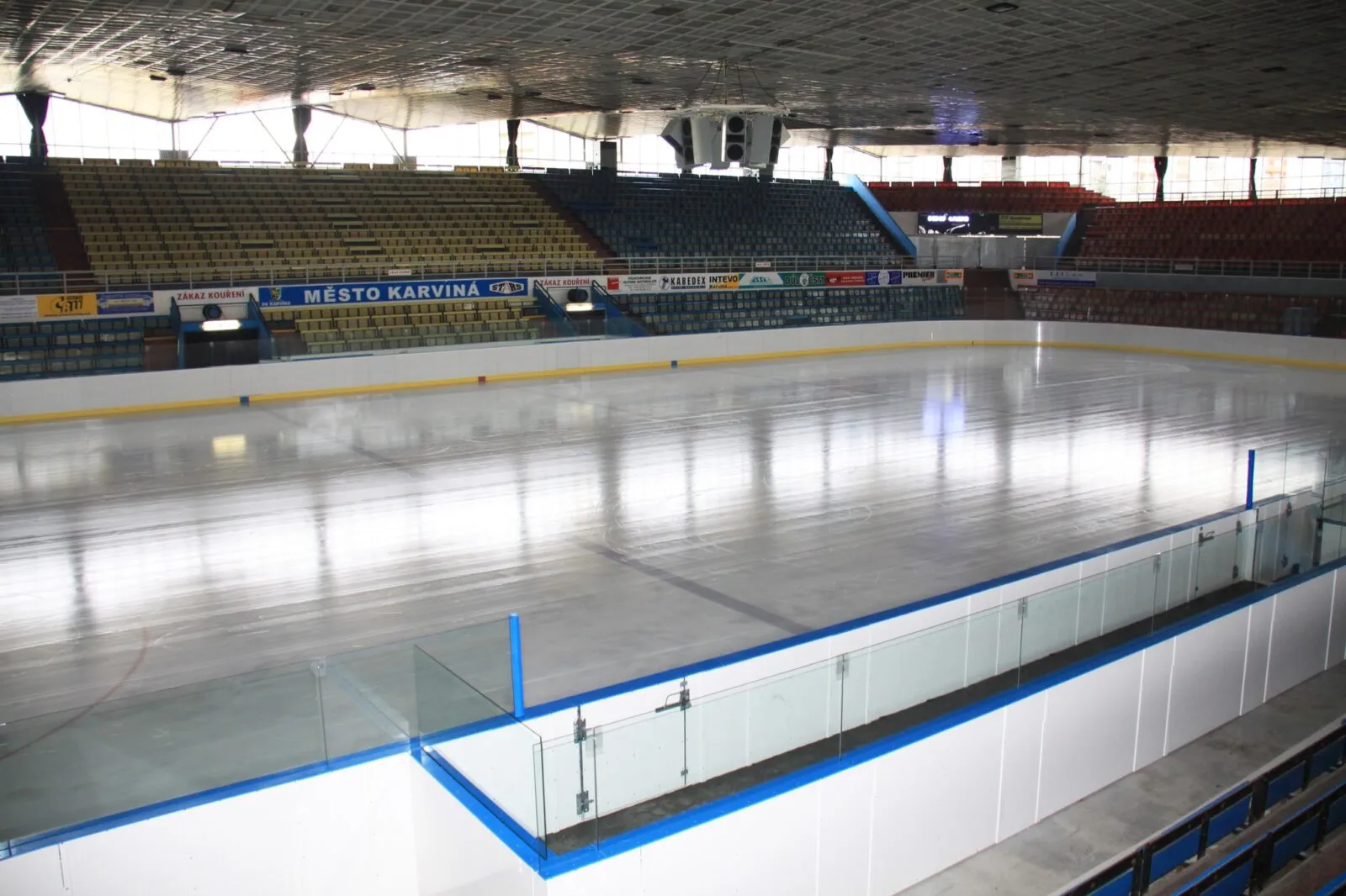 The empty ice and boards of the Karviná winter stadium — Zimní stadion Karviná